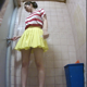 A hidden camera records an unsuspecting Japanese woman taking a piss and massive, long shit into a public floor toilet. Presented in 720P vertical HD format. About 2.5 minutes.